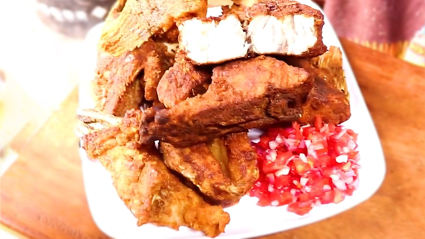 Small Lusaniya - Best Fried Fish in Kampala, Olusaniya, Nile Perch, Kabusu Market, Rubaga Division - Perfect for 1-2 people. Best fried fish in Kampala - Nile Perch on massive plates, fried to perfection with authentic Ugandan spices.